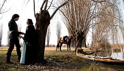          . 2013  -  Just married Romeo and Juliet are parting by the river. Scene from Carlei's film