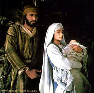        - Mary with her baby, Jesus, and Joseph (Yorgo Voyagis and Olivia Hussey)