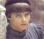 Romeo's first appearance in the film (at the corner of the real Via Ducale in Gubbio)