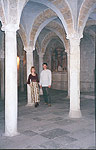 Olga and Vladimir inside the crypt of San Piero church - Capulet's family grave in the film